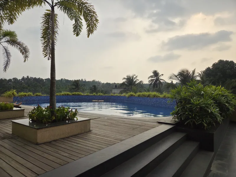 A modern resort with a large pool deck (representative image)